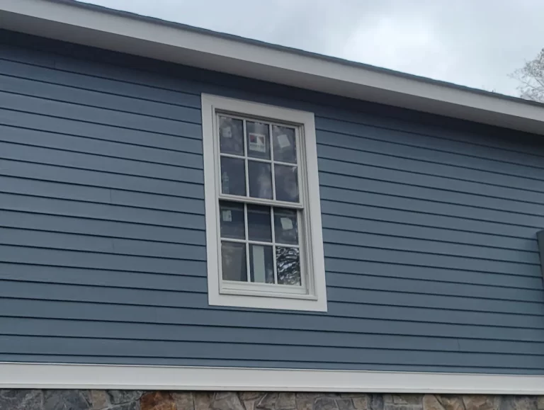 window with trim and siding around