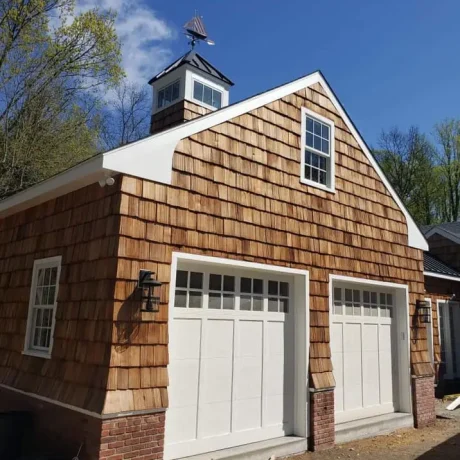 a house with a weather vane on top of it