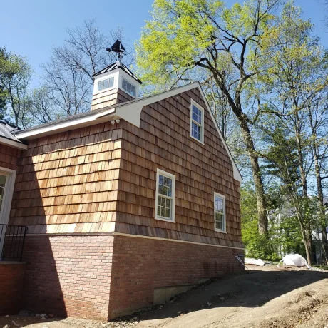 a building with weathervane on top