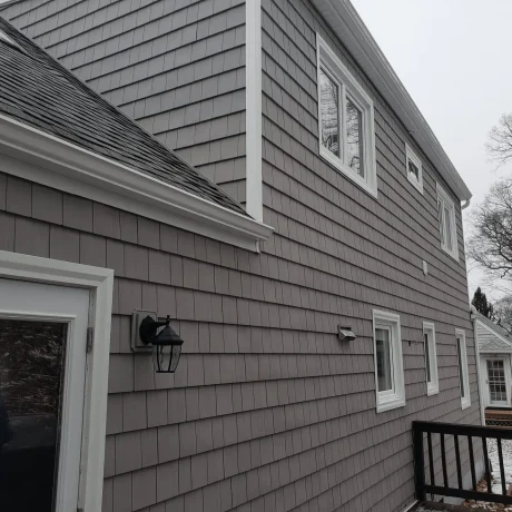 a house with a porch and a railing