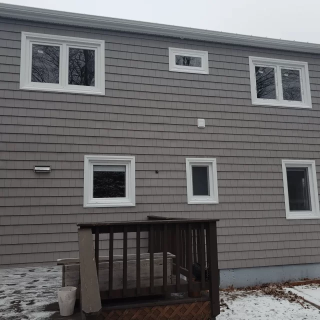 a house with a deck and a porch